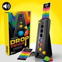 
              Promotional setup for Trivial Pursuit: Drop Trivia board game. The display includes the vertical drop tower with colored discs, trivia cards featuring categories like 'Number of teeth' and 'Zodiac signs,' and the game box with vibrant, multicolored graphics. The image highlights the game's fast-paced and family-friendly gameplay for ages 13 and up
            